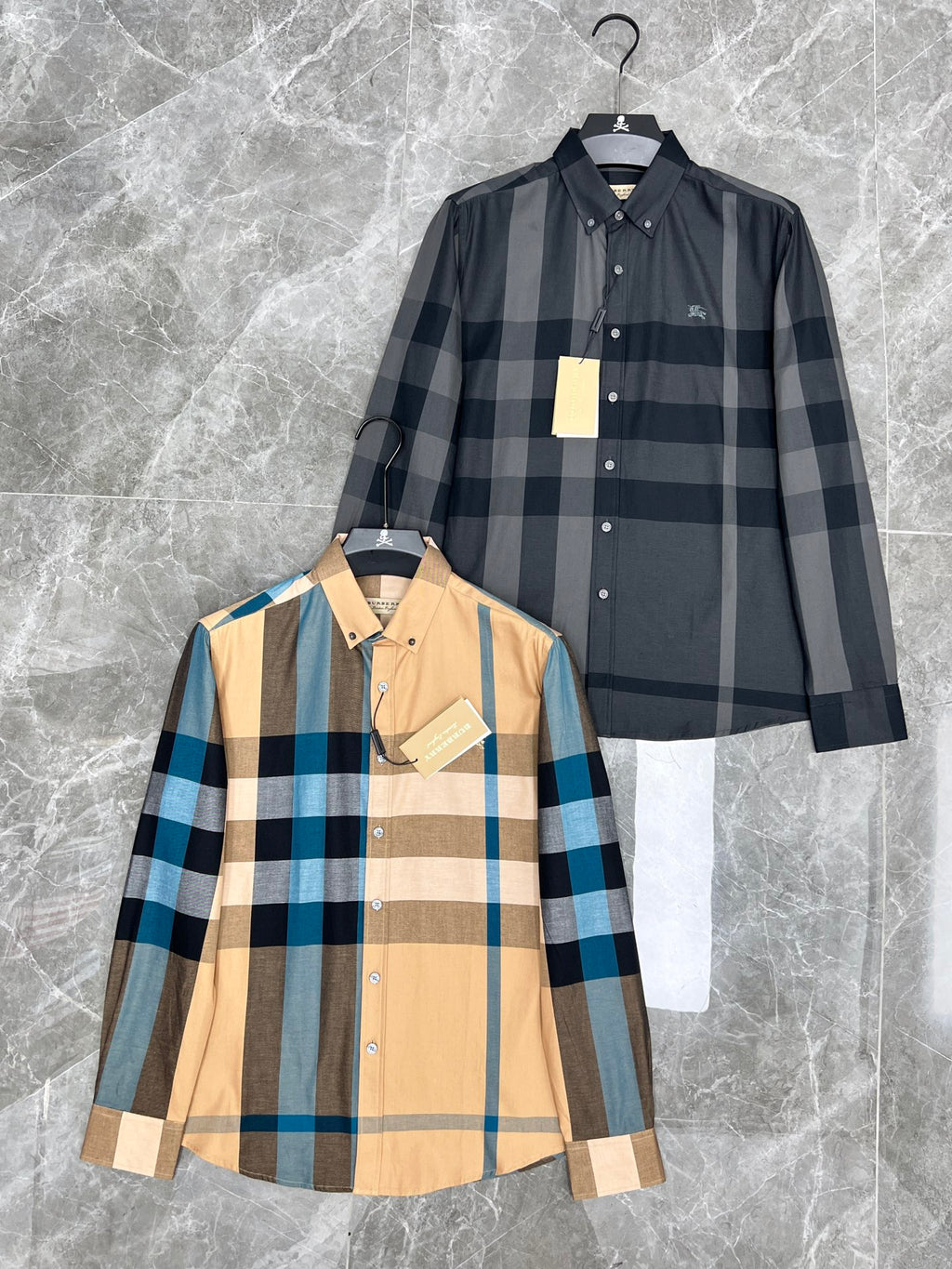 Burberry long-sleeve button-up shirt in beige, blue, and dark plaid with chest pockets
