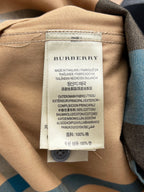Burberry inner label on tan check-pattern long shirt with care and fabric details