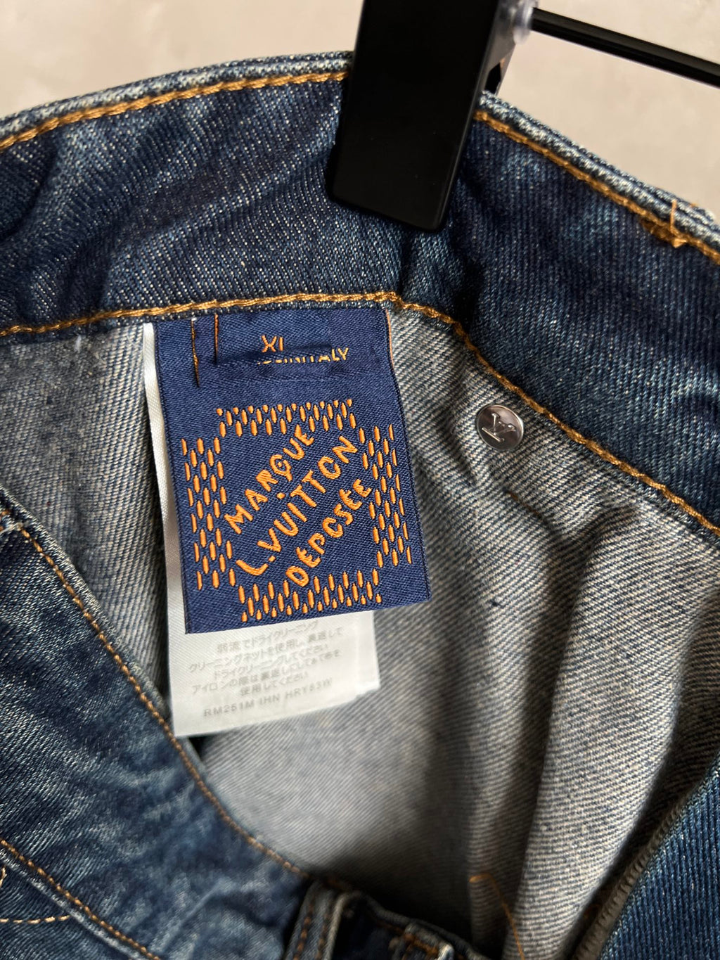 Louis Vuitton Paris fabric label inside dark blue denim waistband
