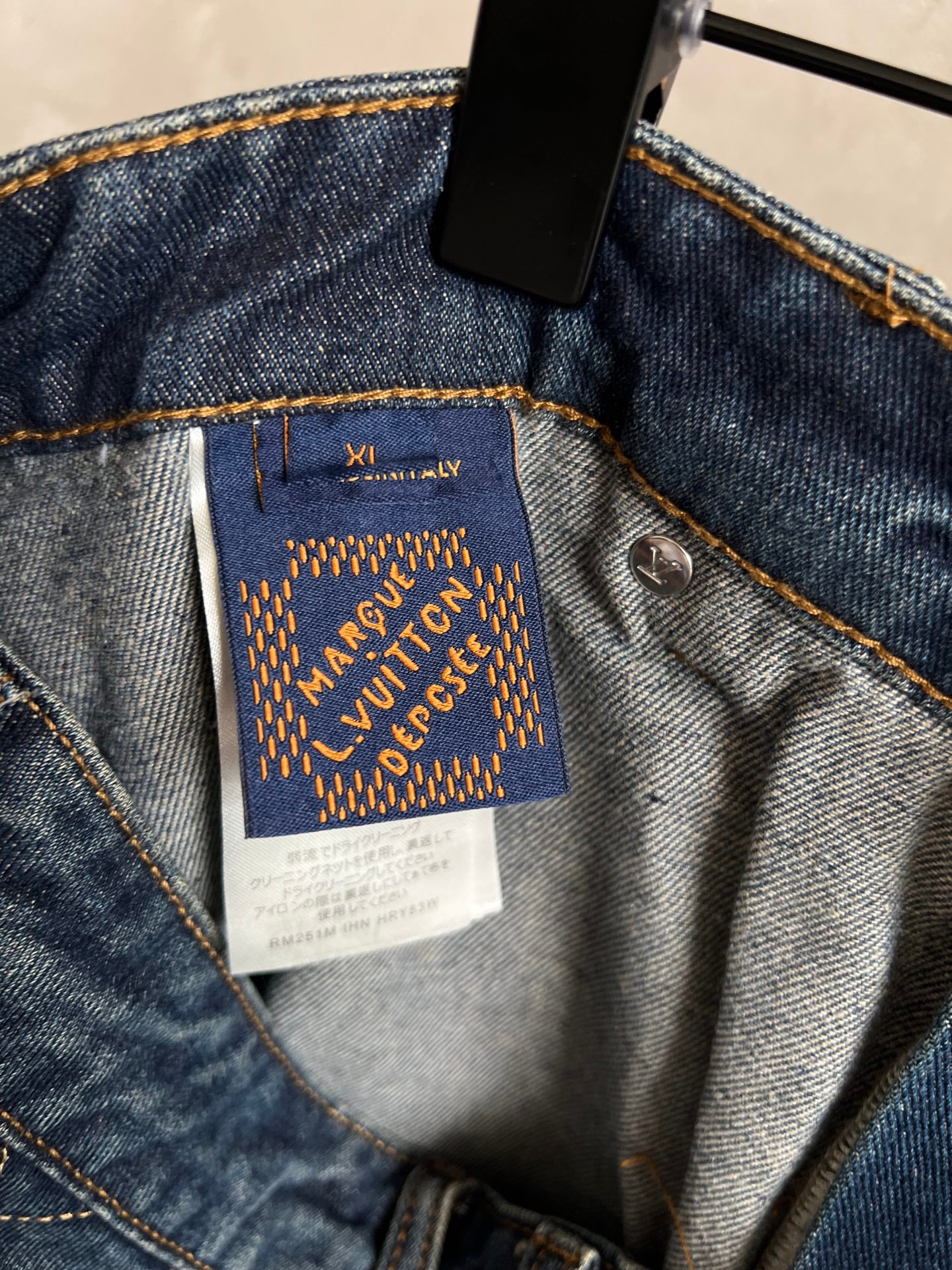 Louis Vuitton Paris fabric label inside dark blue denim waistband