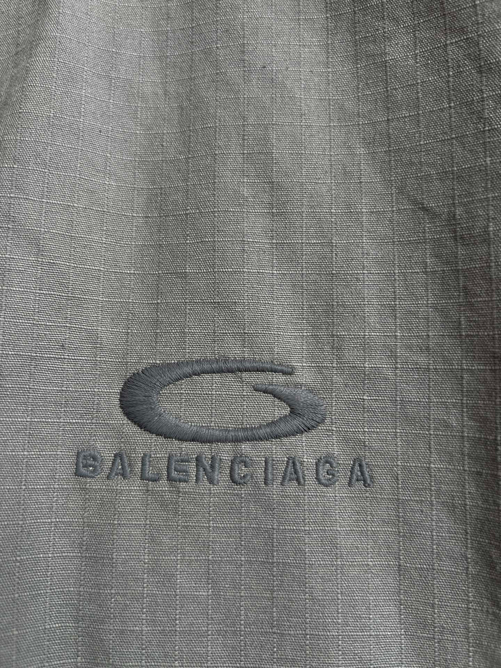 BALENCIAGA logo embroidery on light gray fabric