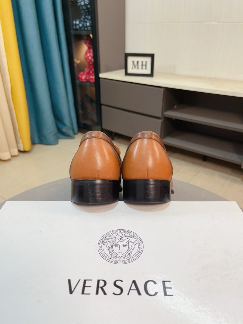 Versace leather loafer heel view, tan-brown with dark soles
