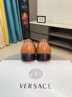 Versace leather loafer heel view, tan-brown with dark soles
