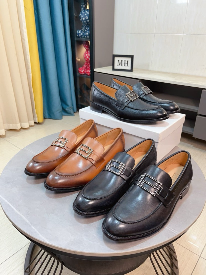 Versace leather loafer pair with square buckle, tan and dark brown colorways