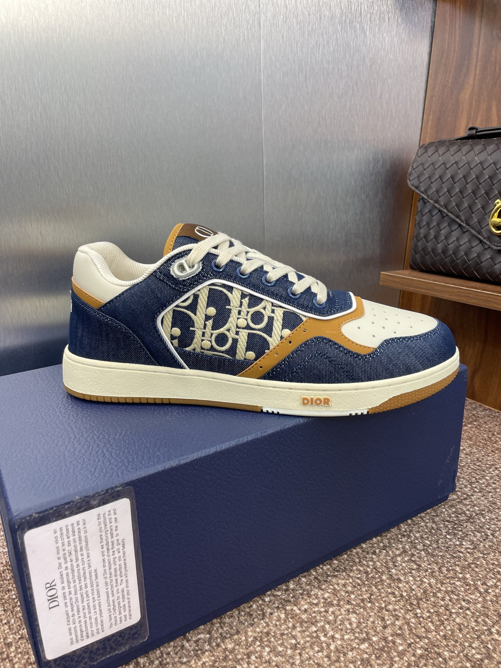 Dior unisex sneakers, navy blue with white laces and tan/gold logo panel