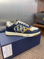 Dior unisex sneakers, navy blue with white laces and tan/gold logo panel