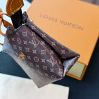 Small Louis Vuitton monogram small bag interior view with zip top and tan trim