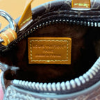 Small Louis Vuitton bag interior label patch with zip lining and dark trim