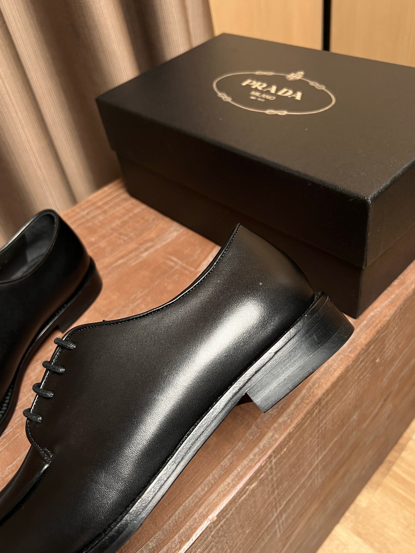 Black leather lace-up shoes with short stacked heel and smooth upper