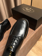 Black leather lace-up shoes close-up of toe shape and lace eyelets