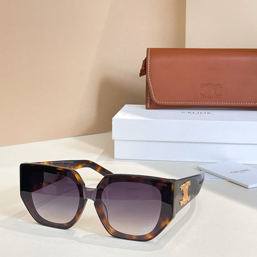 Tortoiseshell sunglasses with purple-tinted lenses and gold logo temple detail