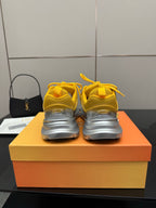 Women’s Dior lace-up sneakers, yellow with silver heels and lace-up backs