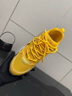Women’s Dior lace-up sneaker, yellow upper with laces and textured toe panel