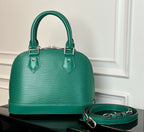Louis Vuitton green handbag with two top handles and matching crossbody strap