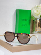 Bottega Veneta sunglasses with tortoiseshell frame and brown tinted lenses
