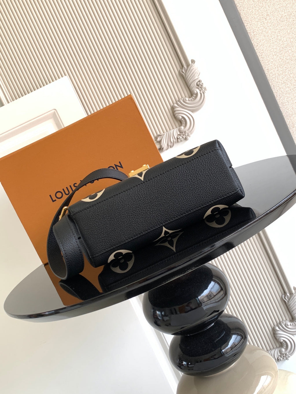 Louis Vuitton monogram mini bag with strap, black with tan logo print and gold studs