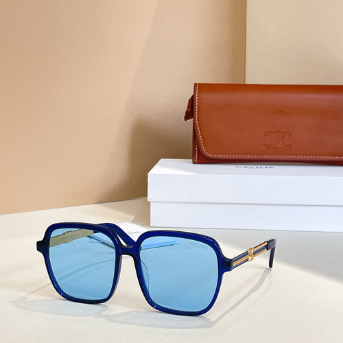 Celine sunglasses with dark blue square frames and blue tinted lenses, gold hinges.