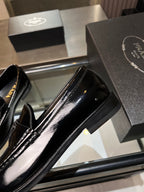 Prada unisex patent loafer, black glossy toe with stitched apron detail