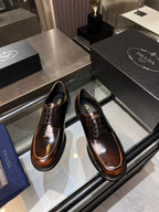 Dark brown leather lace-up shoes with contrast welt and rubber sole