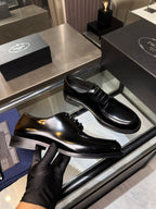 Prada black leather lace-up shoes with thick soles, glossy finish, side angle