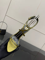 Designer high-heel sandal, yellow toe with green straps and open side profile