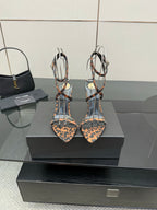 YSL women’s leopard-print heeled sandals with black T-strap and gold-tone stiletto heels