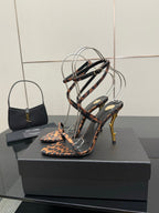 YSL women’s leopard-print heeled sandal with black T-strap and gold-tone stiletto heel
