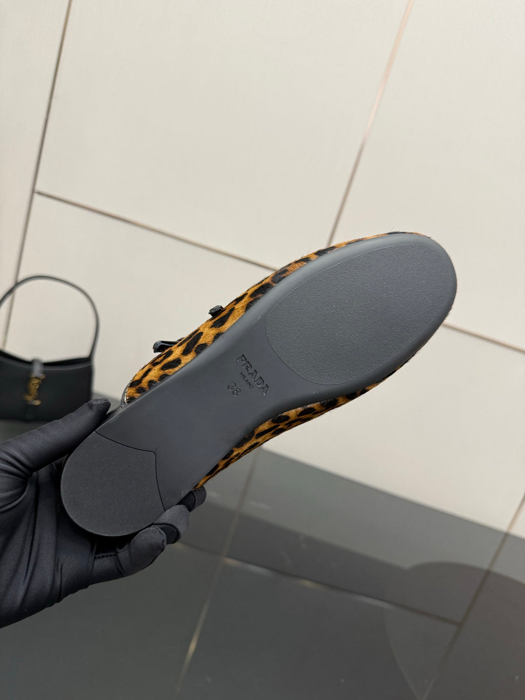 Prada leopard-print flat outsoles with gray sole surface