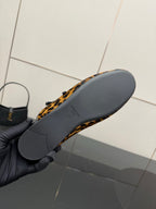 Prada leopard-print flat outsoles with gray sole surface