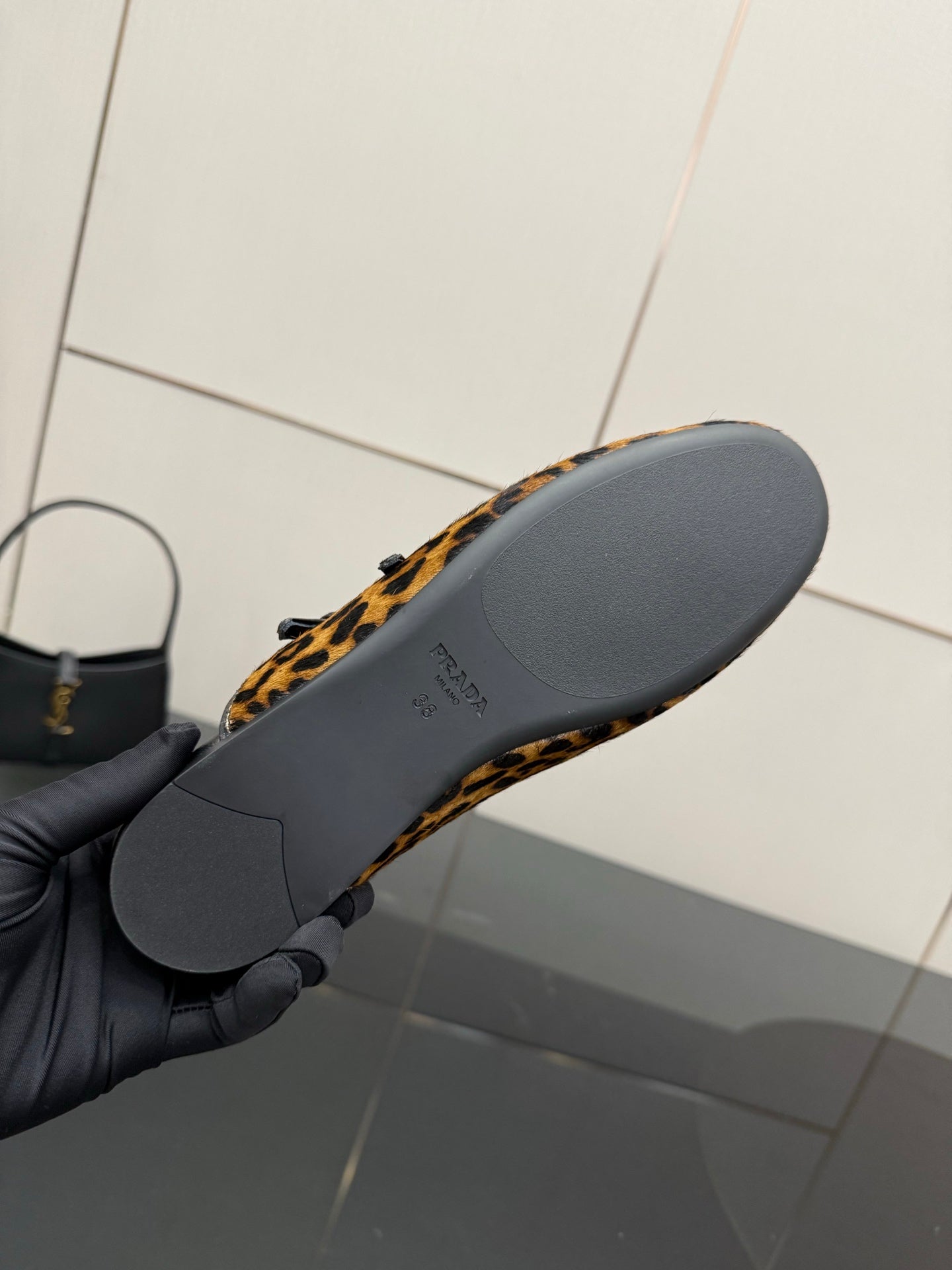 Prada leopard-print flat outsoles with gray sole surface