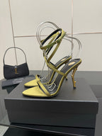 Designer high-heel sandals, yellow footbed with green ankle-strap and stiletto heel