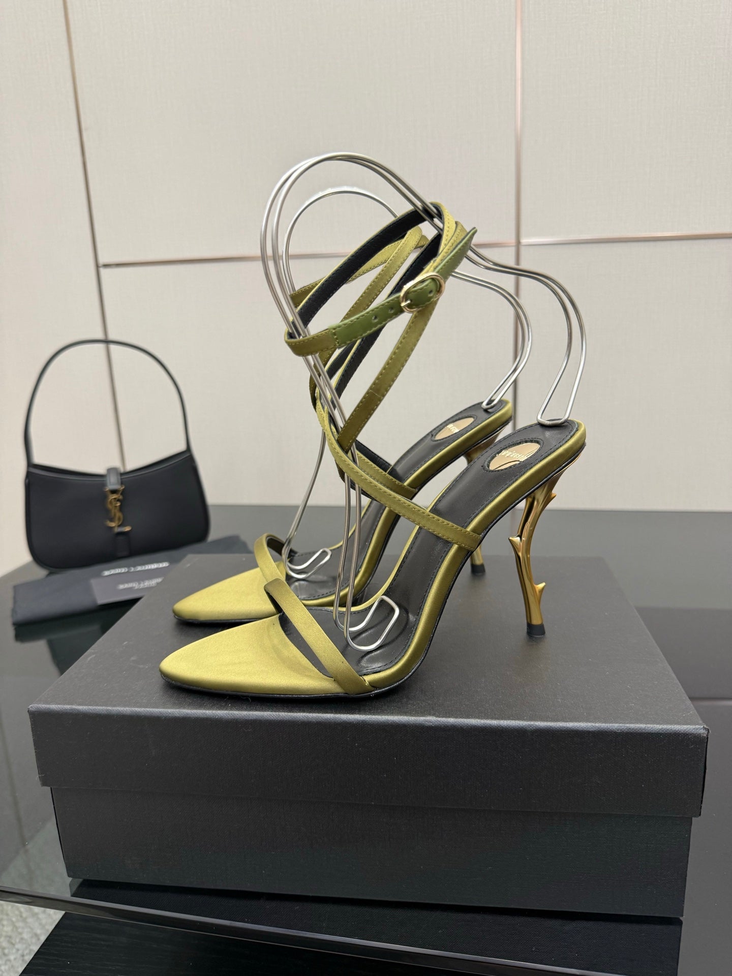 Designer high-heel sandals, yellow footbed with green ankle-strap and stiletto heel