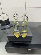 Designer high-heel sandals, yellow open toe with green straps and thin gold stiletto