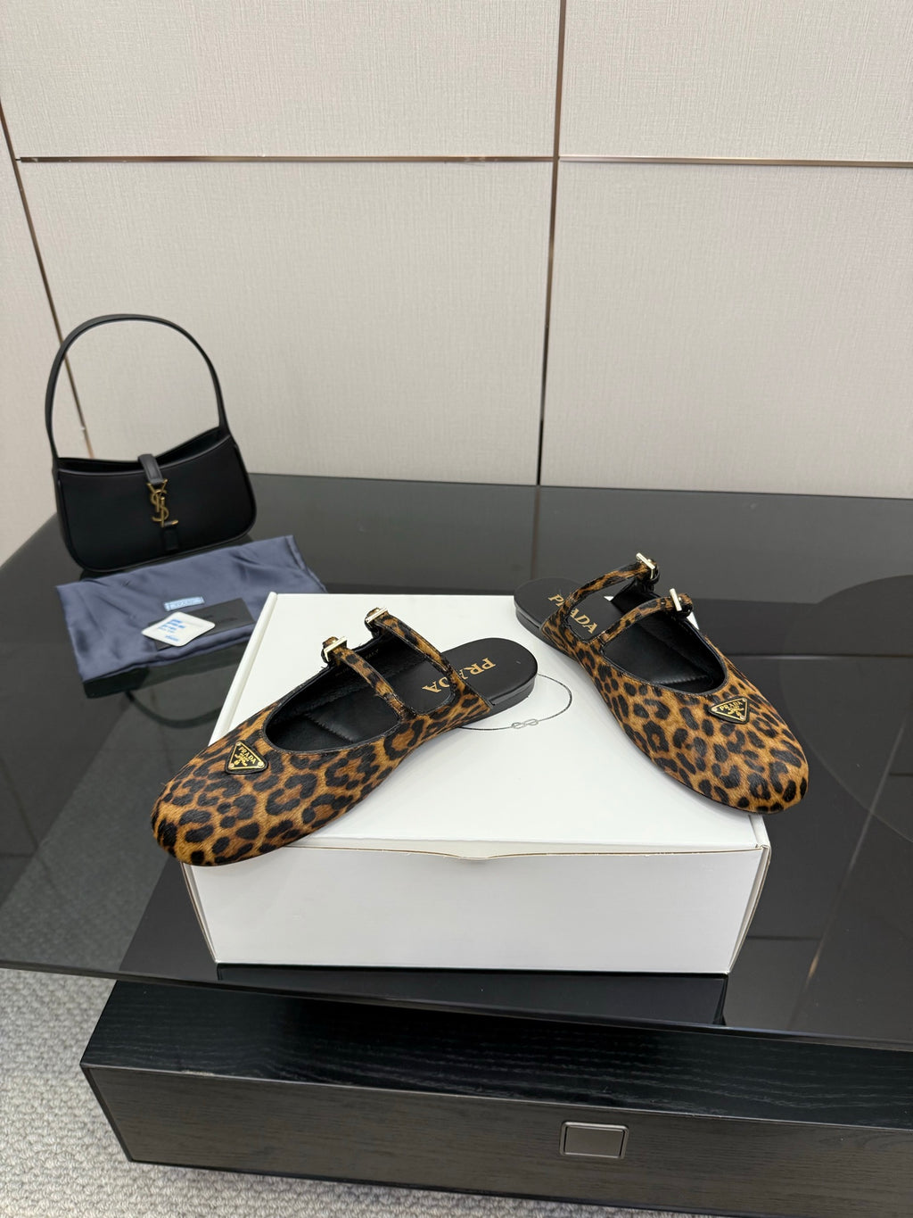 Prada ladies leopard-print slingback flats with ankle strap and gold buckle