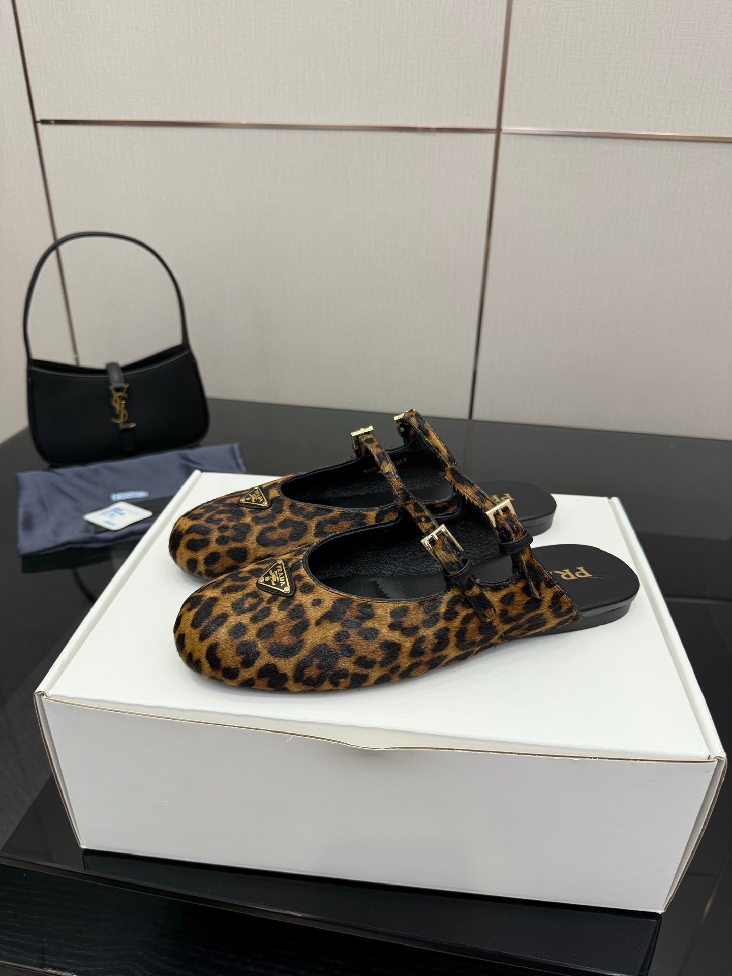 Prada leopard-print slide flats with ankle strap and gold buckle ornament