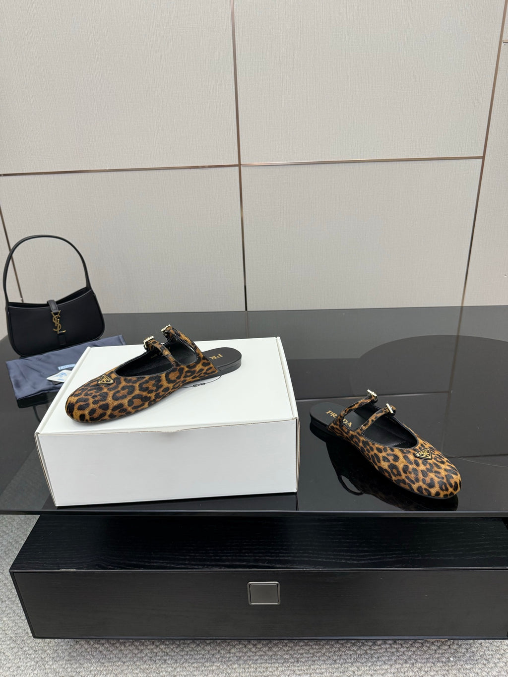 Prada leopard-print mules with ankle strap and gold buckle, front view