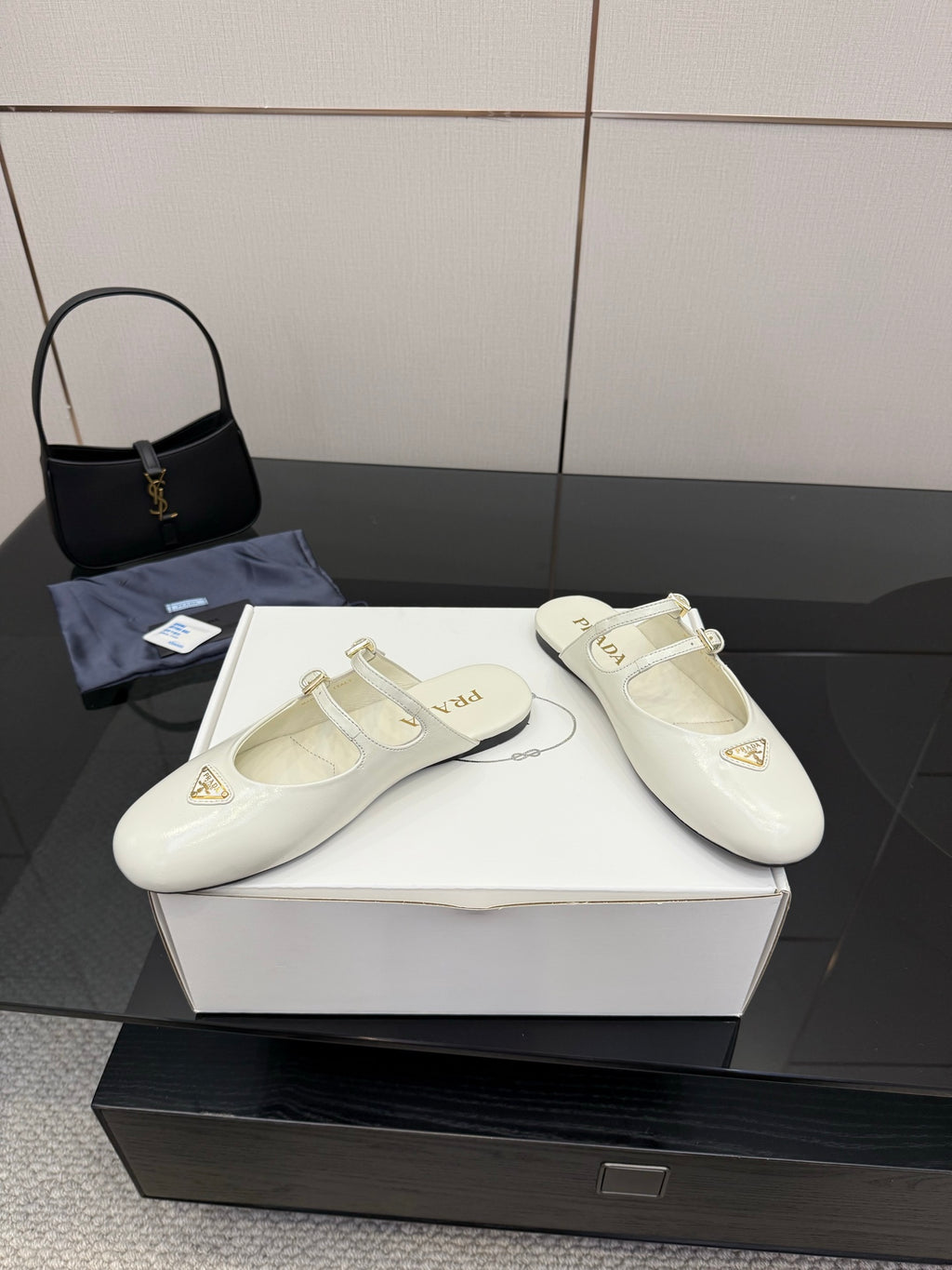 Women's Prada white leather flats on box, square-toe style with double buckle straps