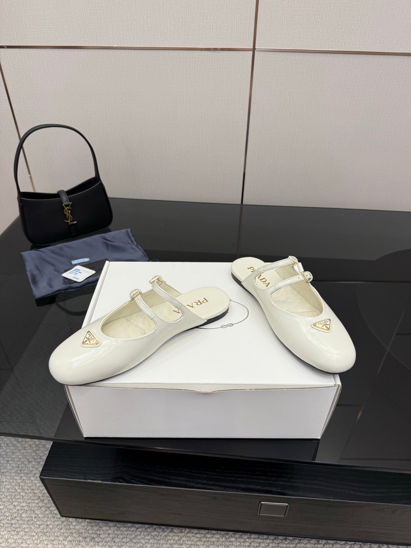 Women's Prada white leather flats on box, square-toe style with double buckle straps