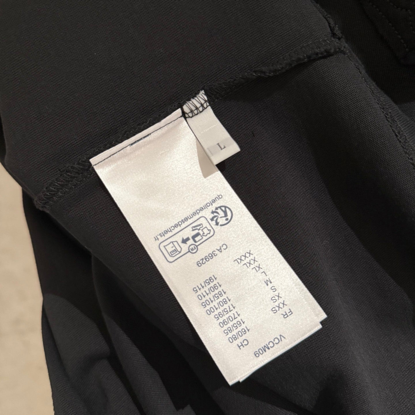 Louis Vuitton black T-shirt with interior size label stitched at hem