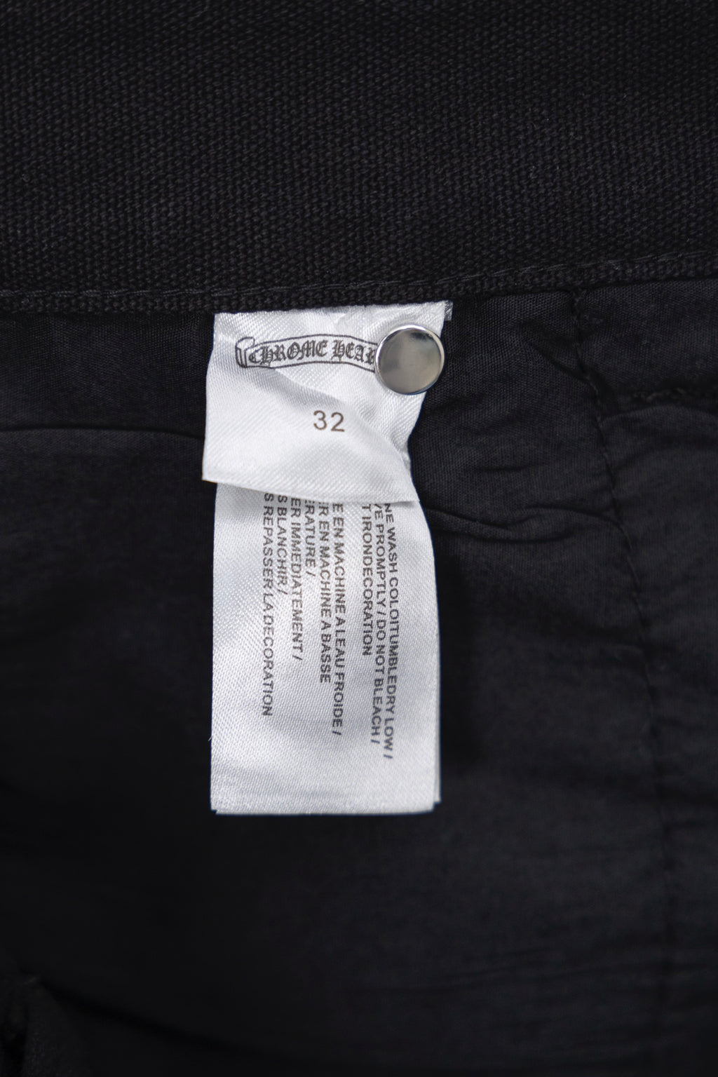 Chrome pants with size 32 fabric label near waistband