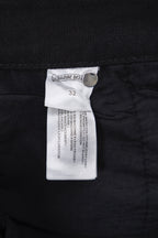 Chrome pants with size 32 fabric label near waistband
