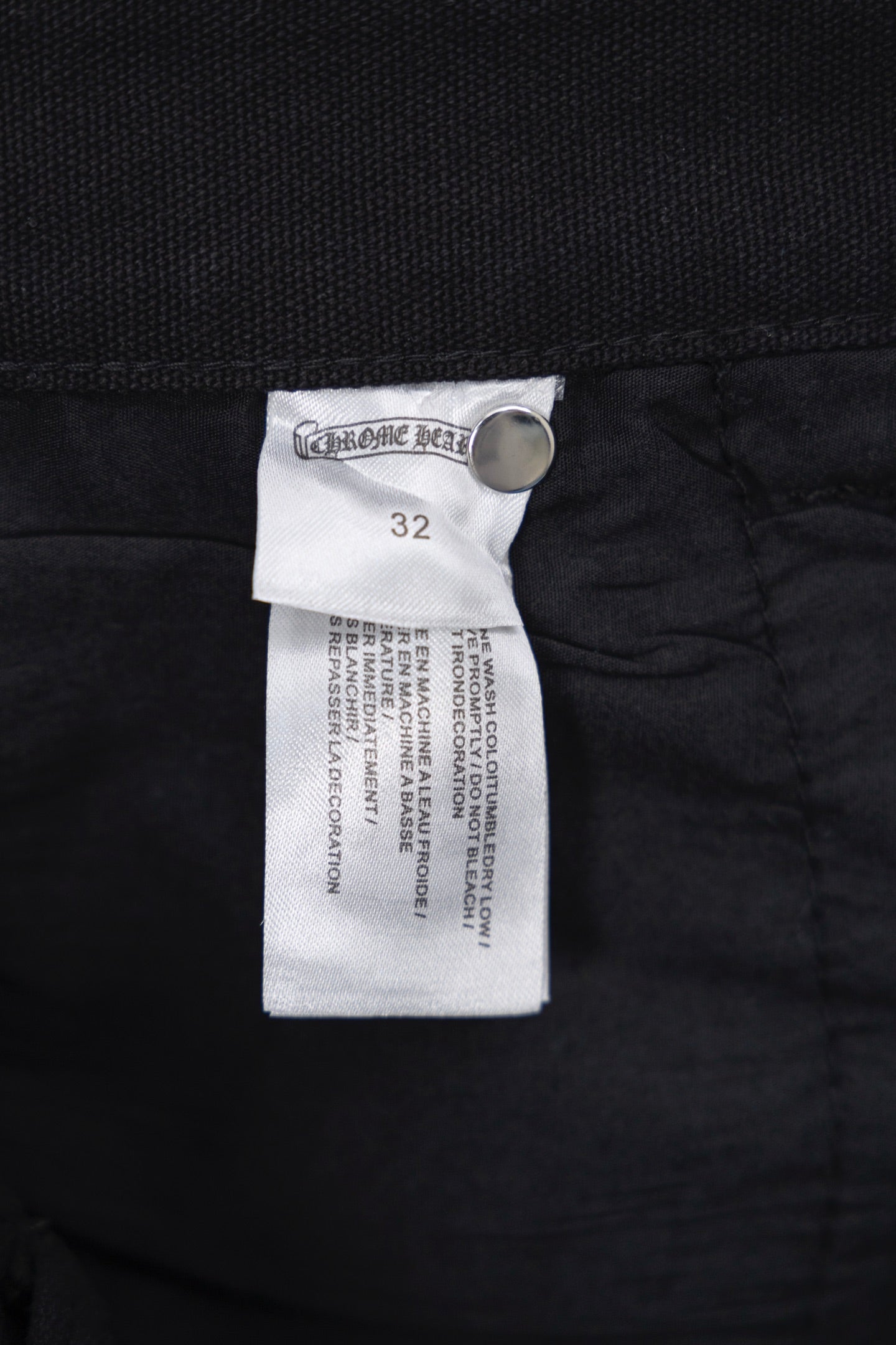 Chrome pants with size 32 fabric label near waistband