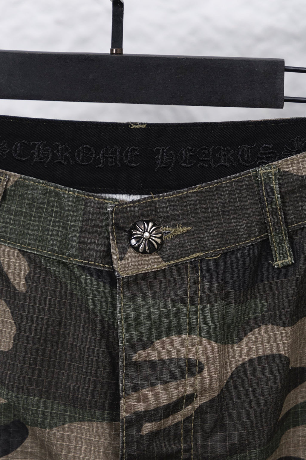 Chrome pants with camo waistband, decorative metal front button