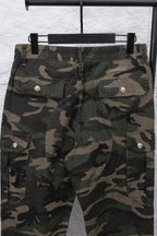 Camouflage pants front view with multiple cargo pockets and metal buttons