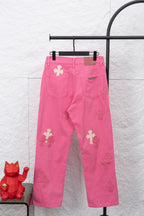 Pink wide-leg denim pants with front pockets and light cross appliques