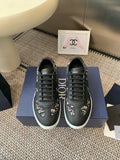 Dior unisex low-top sneakers, black with patterned panels and black laces