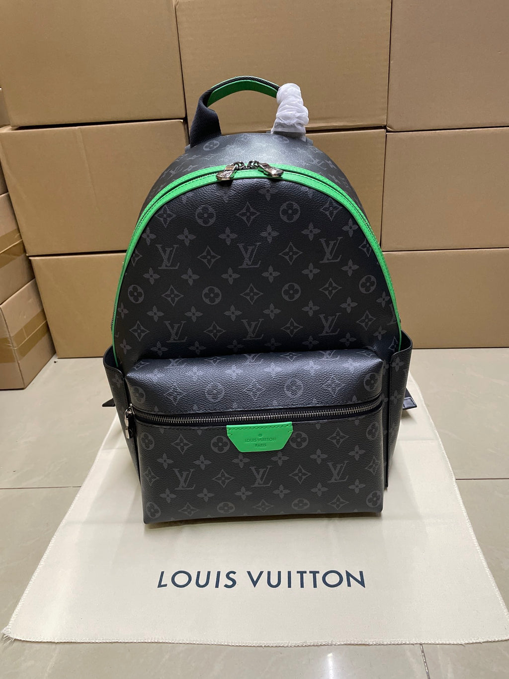 Louis Vuitton monogram mini backpack with green trim and top handle