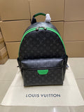 Louis Vuitton monogram mini backpack with green trim and top handle