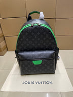 Louis Vuitton monogram mini backpack with green trim and top handle