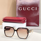 Tortoiseshell square sunglasses with tan gradient lenses and gold logo accents